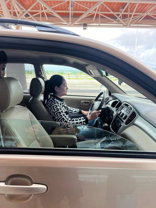 Portrait of a woman driver at the wheel