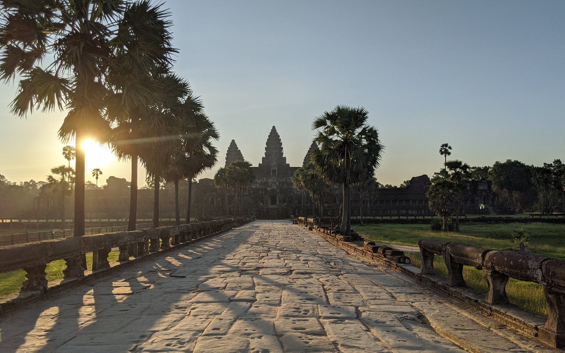 Sunrise on the causeway leading to Angkor Wat